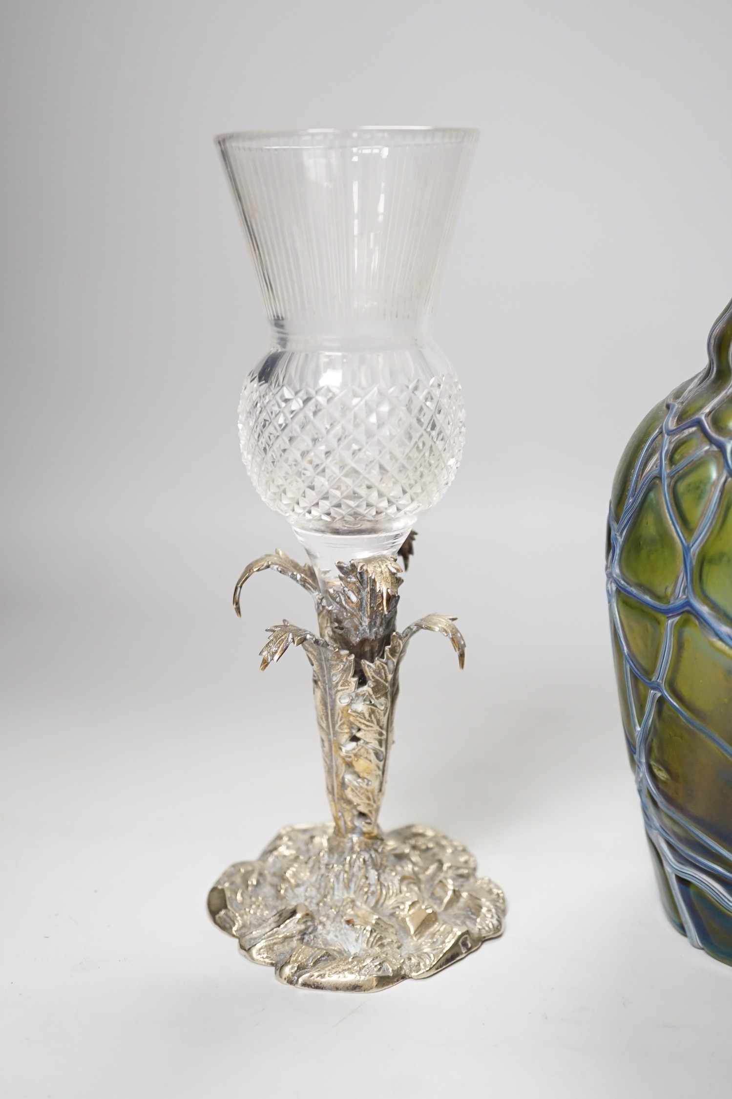 A Victorian thistle vase on cast plated base and a Pallme-Konig Art Nouveau glass vase